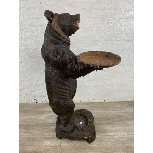 56 - A late 19th/early 20th century Black Forest carved wooden bear free standing umbrella stick stand - ... 