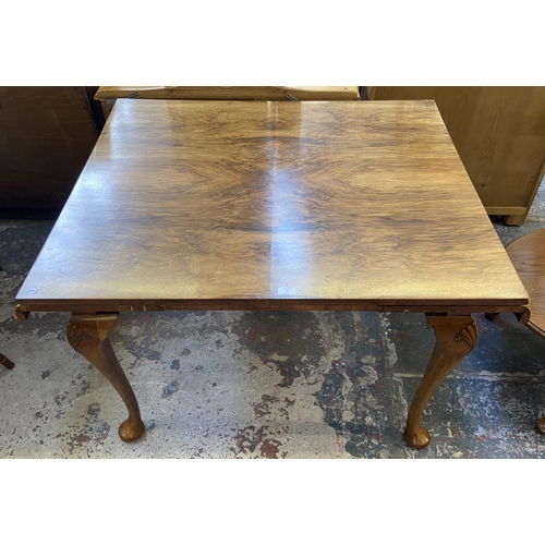 67 - A Queen Anne style walnut draw leaf dining table - approx. 77cm high x 91cm wide x 111cm long
