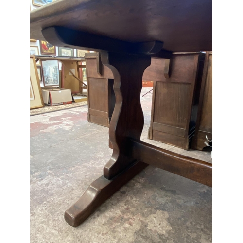 69 - A Titchmarsh & Goodwin style oak refectory table - approx. 75cm high x 93cm wide x 193cm long