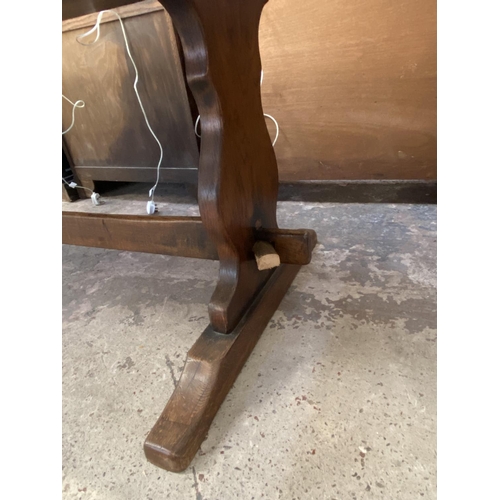 69 - A Titchmarsh & Goodwin style oak refectory table - approx. 75cm high x 93cm wide x 193cm long