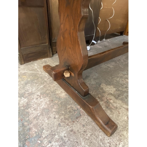 69 - A Titchmarsh & Goodwin style oak refectory table - approx. 75cm high x 93cm wide x 193cm long