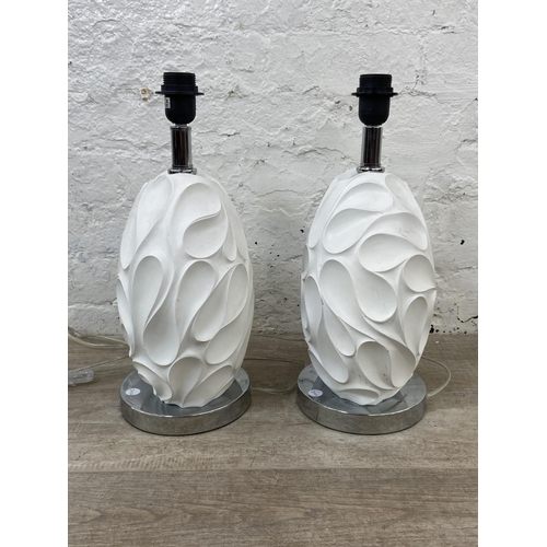 75 - A pair of Dar Lighting Zachary sculptured white resin and chrome plated table lamps - approx. 43cm h... 