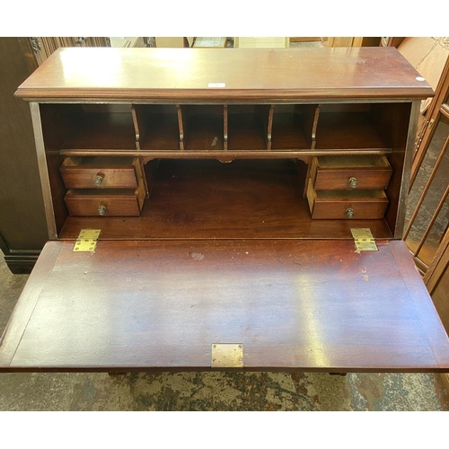 77 - An Edwardian mahogany bureau bookcase - approx. 110cm high x 92cm wide x 40cm deep