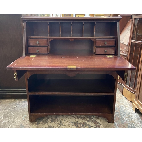 77 - An Edwardian mahogany bureau bookcase - approx. 110cm high x 92cm wide x 40cm deep