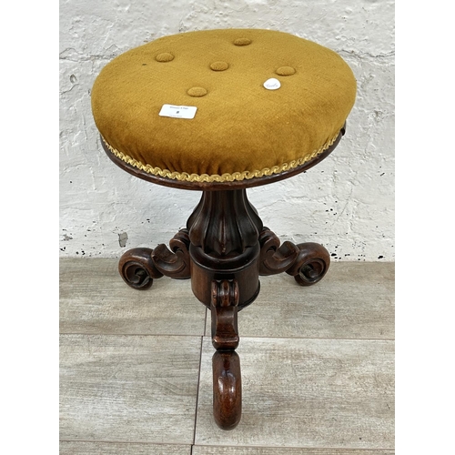 8 - A Victorian carved mahogany and yellow fabric upholstered tripod piano stool - approx. 46cm high x 3... 