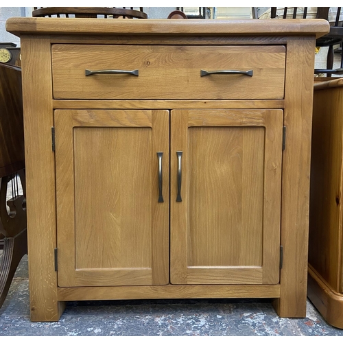 80 - A modern oak sideboard - approx. 86cm high x 85cm wide x 37cm deep