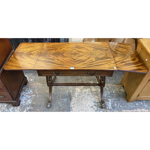 82 - A Regency style mahogany drop leaf lyre end sofa table - approx. 76cm high x 88cm wide not extended ... 