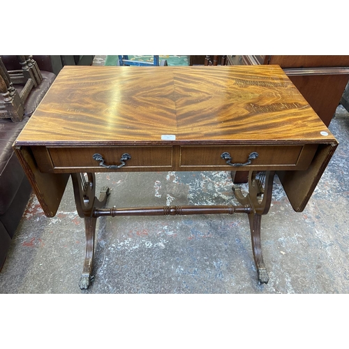 82 - A Regency style mahogany drop leaf lyre end sofa table - approx. 76cm high x 88cm wide not extended ... 