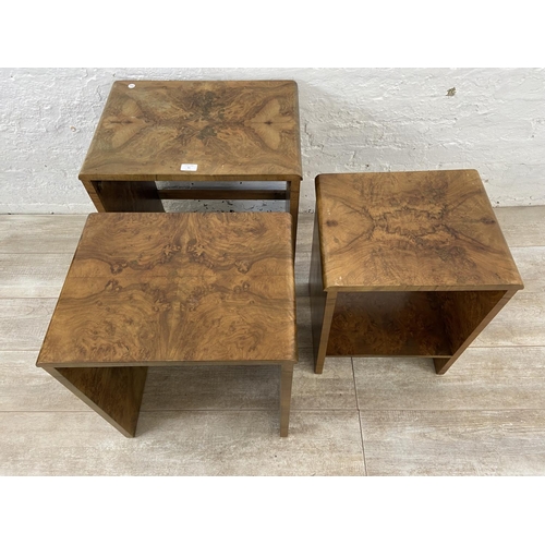 91 - An Art Deco walnut nest of three tables - approx. 59cm high x 53cm wide x 38cm deep