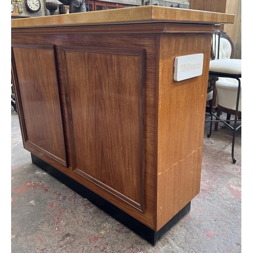 95 - A mid 20th century teak and beech drinks bar - approx. 108cm high x 153cm wide x 58cm deep