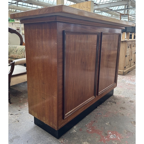 95 - A mid 20th century teak and beech drinks bar - approx. 108cm high x 153cm wide x 58cm deep