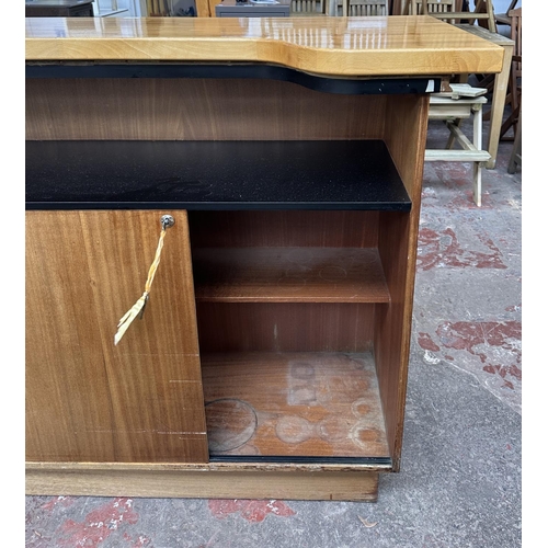 95 - A mid 20th century teak and beech drinks bar - approx. 108cm high x 153cm wide x 58cm deep