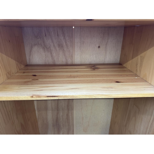99 - A pine double wardrobe - approx. 178cm high x 82cm wide x 53cm deep