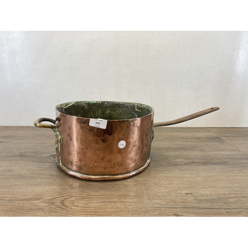 610 - A 19th century copper and brass saucepan - approx. 16cm high x 29cm diameter