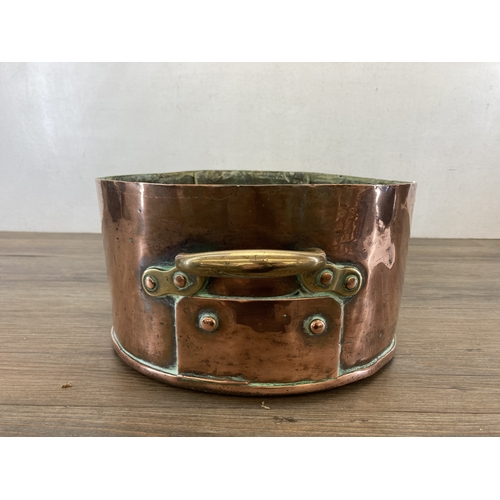 610 - A 19th century copper and brass saucepan - approx. 16cm high x 29cm diameter