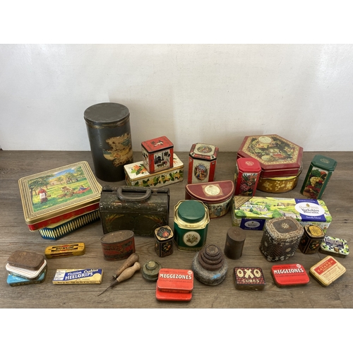 613 - A collection of early/mid 20th century tins to include early 20th century Huntley & Palmers Reticule... 