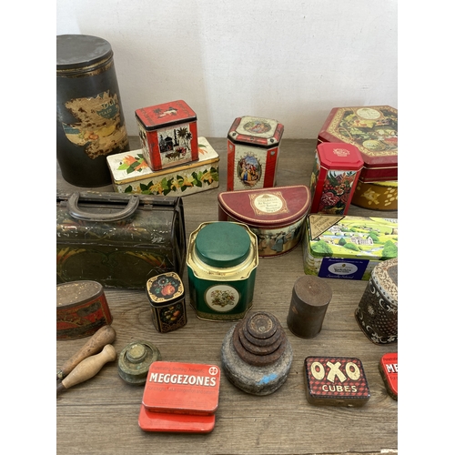 613 - A collection of early/mid 20th century tins to include early 20th century Huntley & Palmers Reticule... 