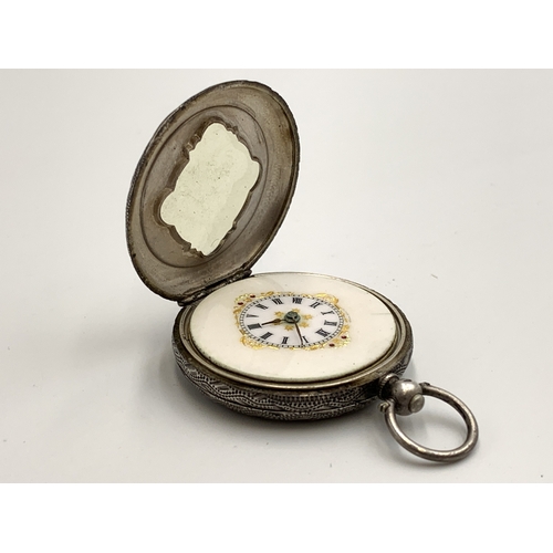 2068 - A Victorian .935 silver cased key wind open face pocket watch - approx. gross weight 34.3g