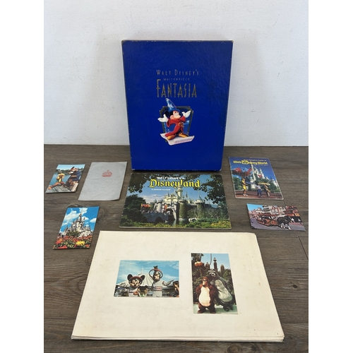 765 - A collection of Walt Disney's Disneyland souvenirs to include The Complete Guide to Walt Disney Worl... 