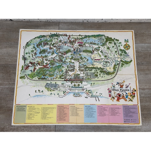 765 - A collection of Walt Disney's Disneyland souvenirs to include The Complete Guide to Walt Disney Worl... 