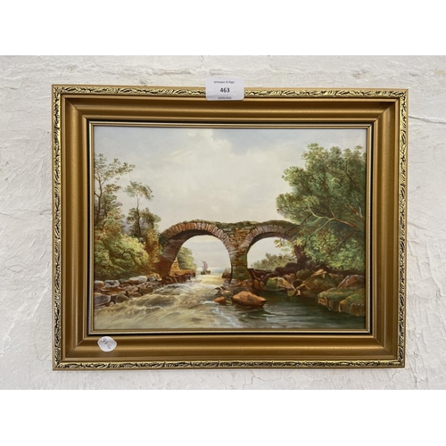 463 - A late 19th/early 20th century gilt framed oil on porcelain of a bridge and stream - approx. 28cm hi... 