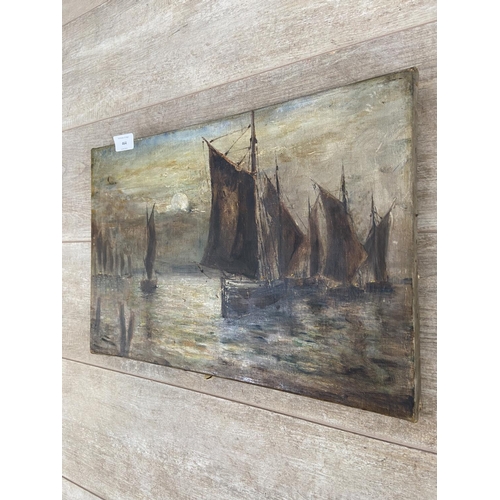 464 - A late 19th/early 20th century unframed oil on canvas of a boating scene - approx. 30cm high x 46cm ... 