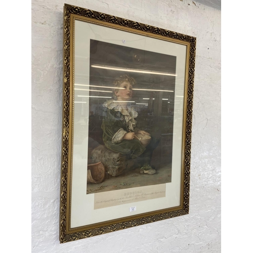 472 - A gilt framed Sir John Everett Millais print titled 