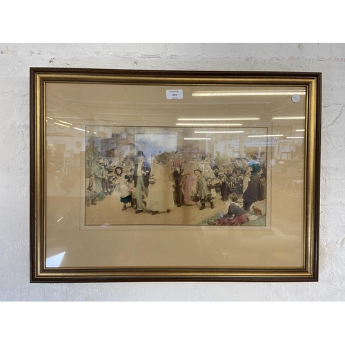 474 - A late 19th century gilt framed hand tinted photograph of a wedding scene - approx. 47cm high x 66cm... 