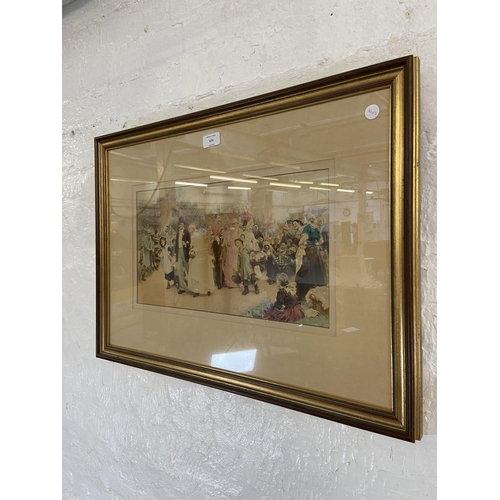 474 - A late 19th century gilt framed hand tinted photograph of a wedding scene - approx. 47cm high x 66cm... 