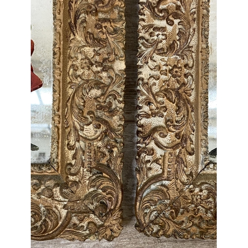 499A - Two 19th century gilt framed wall mirrors with hand painted floral designs - approx. 34cm high x 34c... 