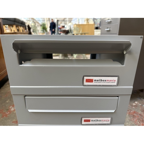 407 - A Joma grey metal six tier mailbox with two sets of keys - approx. 75cm high x 30cm wide x 37cm deep