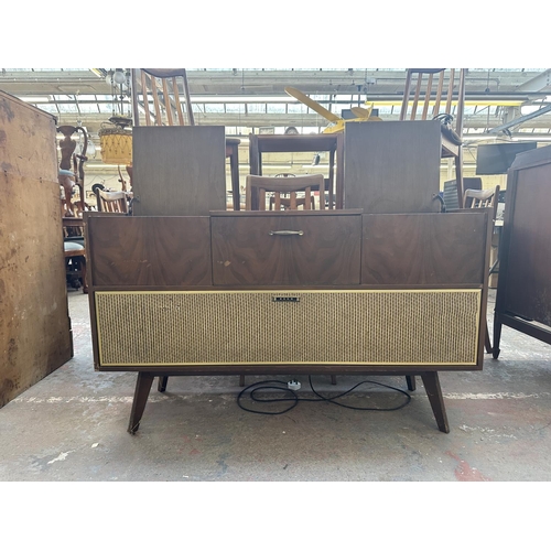 A mid 1960s Ekco SRG431 stereo radiogram comprising four band receiver ...