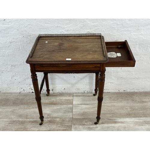 4 - An early/mid 19th century rosewood chamber table with brass galleried top and castors, stamped BS & ... 