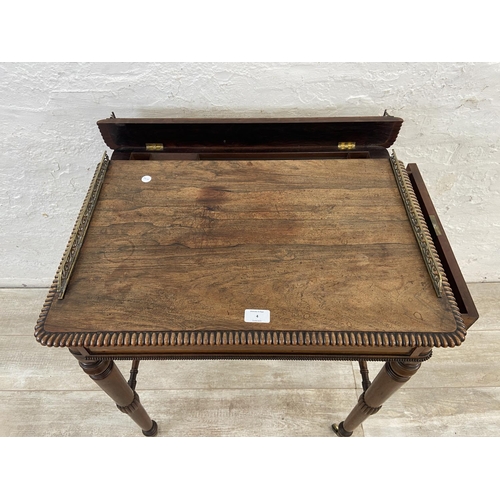 4 - An early/mid 19th century rosewood chamber table with brass galleried top and castors, stamped BS & ... 