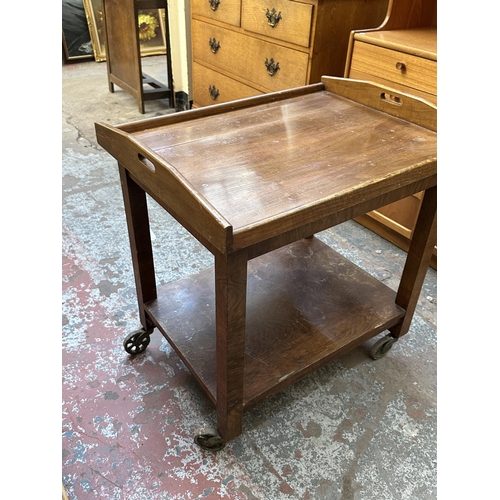 1143 - An Art Deco walnut two tier serving trolley with removable tray - approx. 74cm high x 54cm wide x 70... 