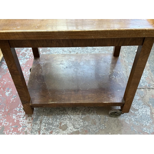 1143 - An Art Deco walnut two tier serving trolley with removable tray - approx. 74cm high x 54cm wide x 70... 