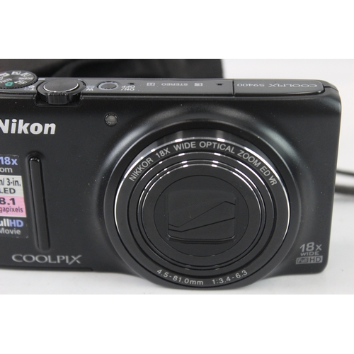 37 - A cased Nikon Coolpix S9400 18.1mp CMOS sensor compact digital camera