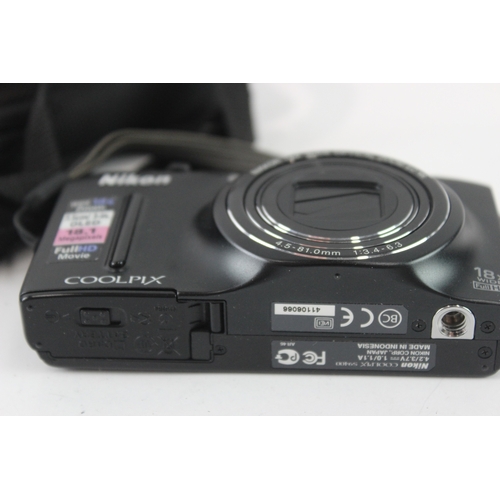 37 - A cased Nikon Coolpix S9400 18.1mp CMOS sensor compact digital camera