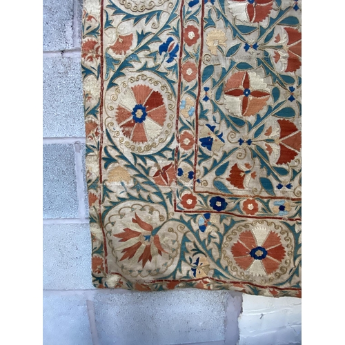 260 - A 19th century Uzbek Suzani floral silk embroidered wall hanging - approx. 160cm x 212cm wide
