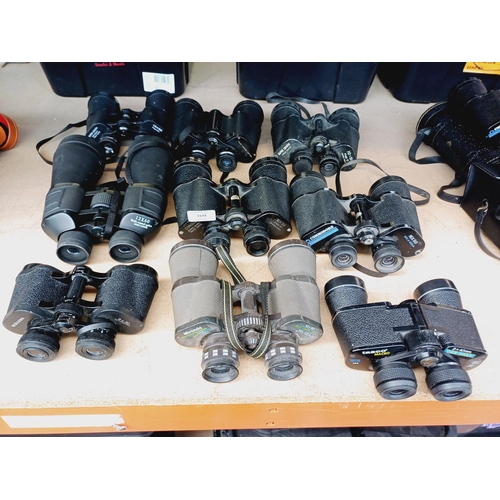 255 - Nine pairs of binoculars to include Miranda, Super Zenith, Tasco etc.