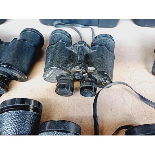 255 - Nine pairs of binoculars to include Miranda, Super Zenith, Tasco etc.