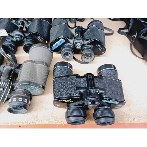 255 - Nine pairs of binoculars to include Miranda, Super Zenith, Tasco etc.