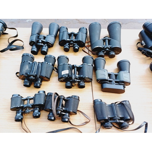 270 - Nine pairs of binoculars to include Greenkat, Tannhauser, Visionary etc.