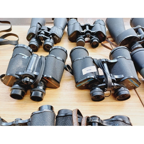 270 - Nine pairs of binoculars to include Greenkat, Tannhauser, Visionary etc.