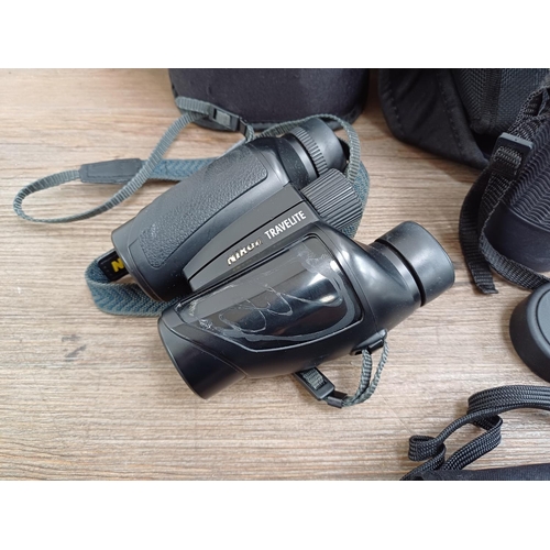 247 - Four cased pairs of binoculars, one Bushnell H2O 10x42 waterproof, one Nikon 8-24x25 pocket zoom, on... 