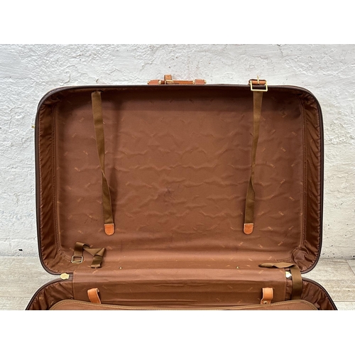 1059 - Two Italian Bojola Original Saddler cream plastic and tan leather suitcases - largest approx. 52cm h... 
