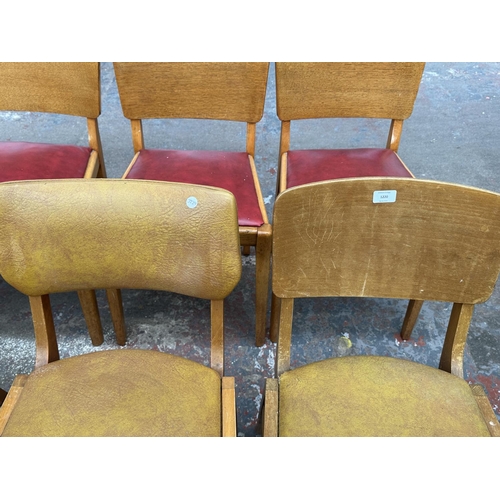 1220 - Four mid 20th century beech and tan vinyl dining chairs