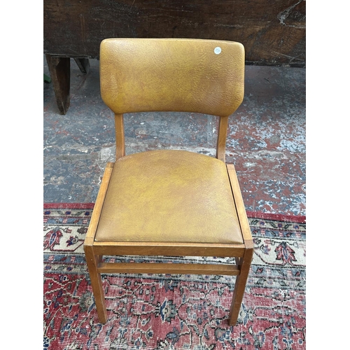 1220 - Four mid 20th century beech and tan vinyl dining chairs