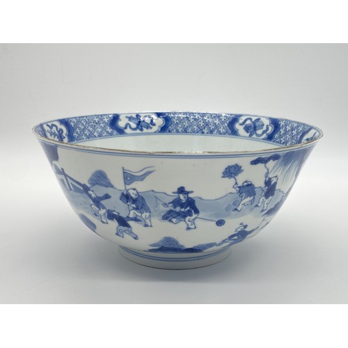 401 - A Chinese blue and white porcelain circular footed bowl with character marks to base - approx. 9cm h...