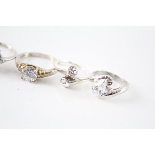 Ten sterling silver CZ rings - approx. gross weight 35g